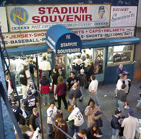fans buying yankees and mets subway series souvenirs